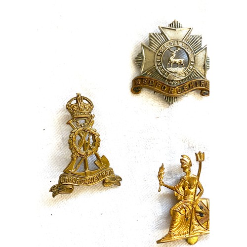 464 - Selection 12 military cap badges