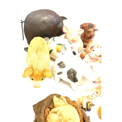 179 - Large selection of assorted pig ornaments includes metal, pottery, straw etc