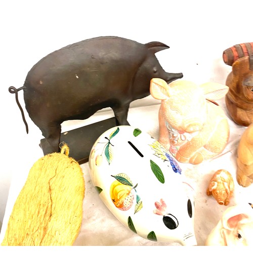 179 - Large selection of assorted pig ornaments includes metal, pottery, straw etc