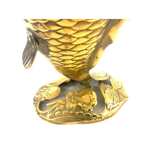 91 - Brass fish believed to be Newlyn with fish, crab and octopus to base, approximate height 26cm