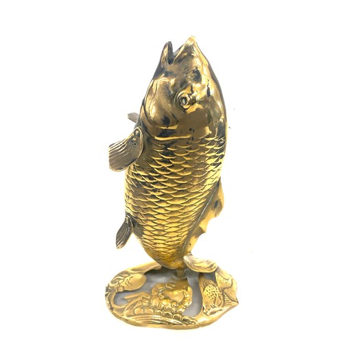 91 - Brass fish believed to be Newlyn with fish, crab and octopus to base, approximate height 26cm