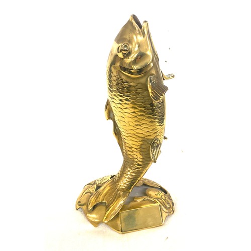 91 - Brass fish believed to be Newlyn with fish, crab and octopus to base, approximate height 26cm