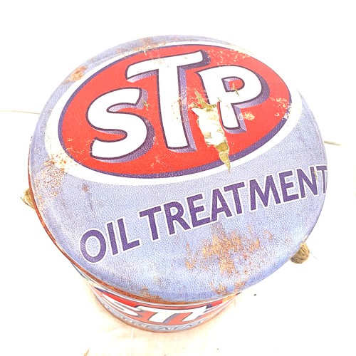 339 - STP oil treatment drum / stool, some damage to seat pad, overall height 13 inches and diameter 13 in... 