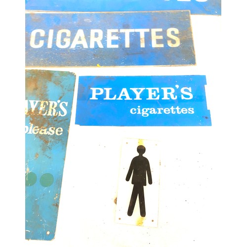 102 - Selection of metal advertising signs mostly cigarette signs, largest measures approximately 26 inche... 