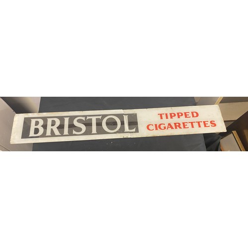 131 - Bristol tipped glass advertising sign, unfortunately this is damaged, approximate measurements: 35.5... 