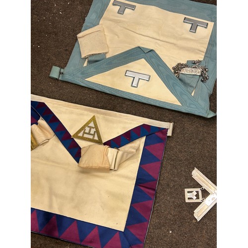 553 - Vintage masonic brief case and a selection of masonic aprons