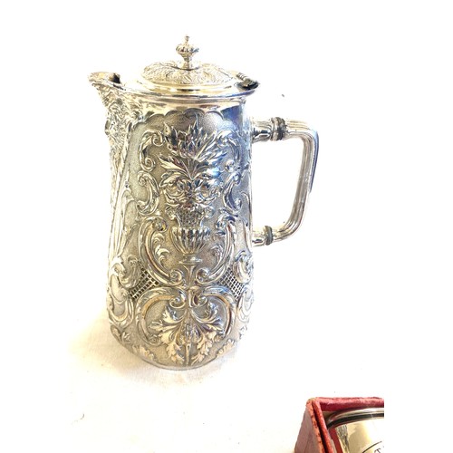 11 - Selection of silver plated items to include 2 Leicester money saving boxes, lidded jug and ricksaw m... 