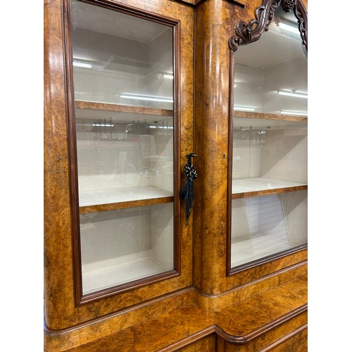 564 - Burr walnut 3 door bookcase, 3 shelfs, lockable doors with key measures approx 94.5 inches tall 80 i... 