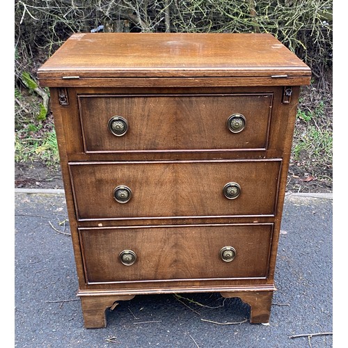 604 - 3 drawer mahogany bedside with lifting top made by maple measures approx 29 inches tall 22 inches wi... 