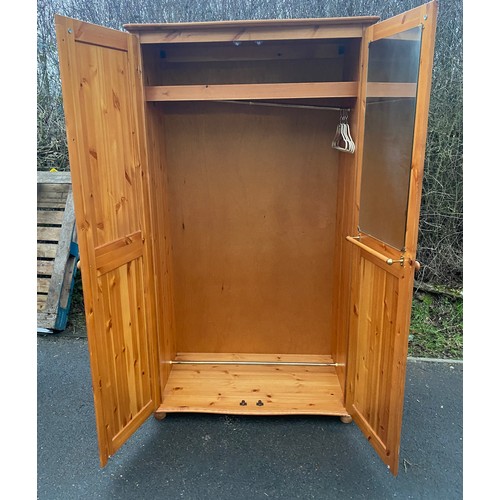 597 - 2 Door pine wardrobe, approximate measurements: Height 71 inches, 41 width, 22 inches depth