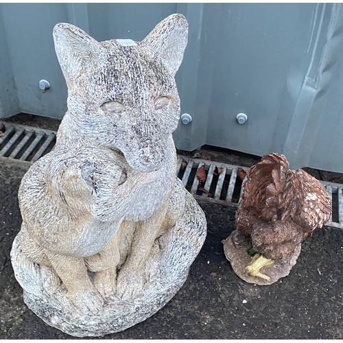 100B - Stoneware fox and a hen