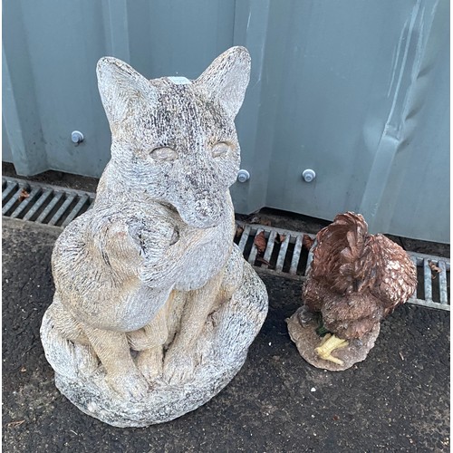 100B - Stoneware fox and a hen