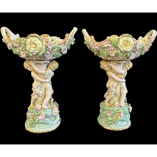 560 - Antique Pair Dressen fruit bowls, Cherub design, made circa 1860, small chips to the flower design a... 