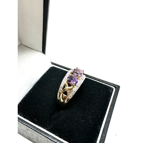 82 - 9ct gold diamond & amethyst ring weight 3.6g