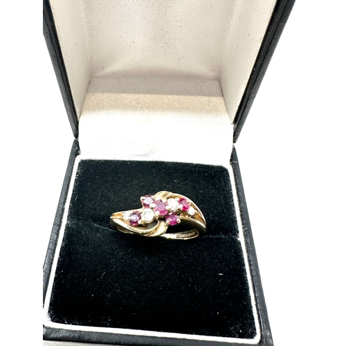 83 - 9ct gold diamond & ruby ring weight 2.9