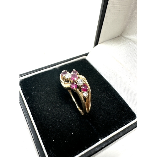 83 - 9ct gold diamond & ruby ring weight 2.9