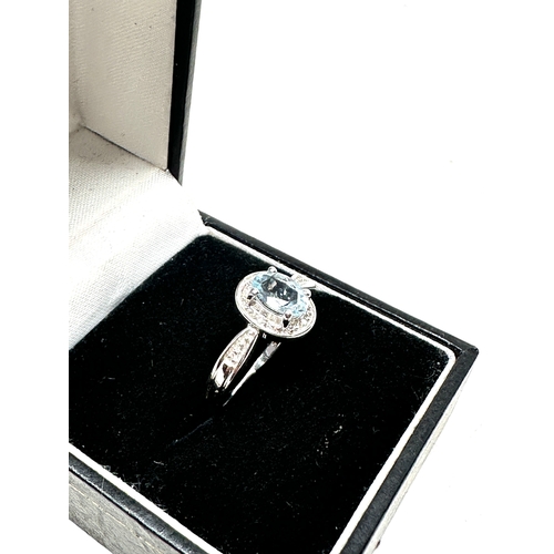 86 - 9ct white gold diamond & aqua ring weight 2.4g