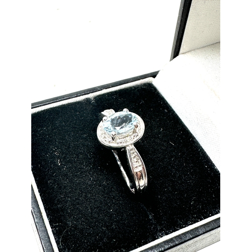 86 - 9ct white gold diamond & aqua ring weight 2.4g