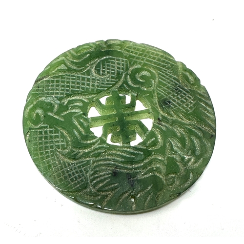 90 - Large Chinese jade roundel measures approx 4.7cm dia