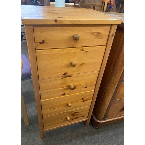 590 - 5 Drawer pine narrow chest measures approx 42 inches tall 21 inches wide 16.5 inches depth