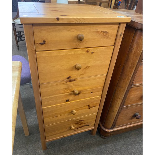 590 - 5 Drawer pine narrow chest measures approx 42 inches tall 21 inches wide 16.5 inches depth