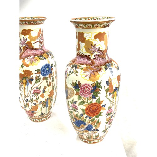 30 - Pair of oriental style vases- approx height 12 inches