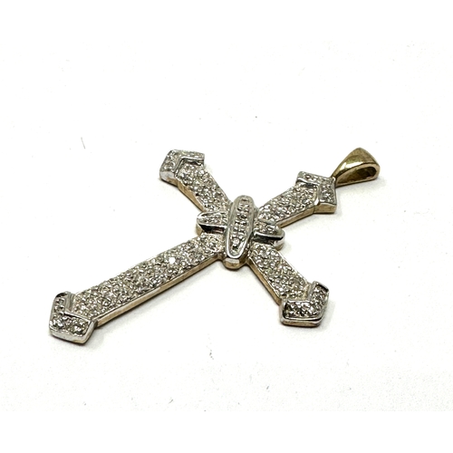 91 - Large 9ct gold diamond cross / pendant measures approx 4.2cm drop by 2.7cm weight 3g