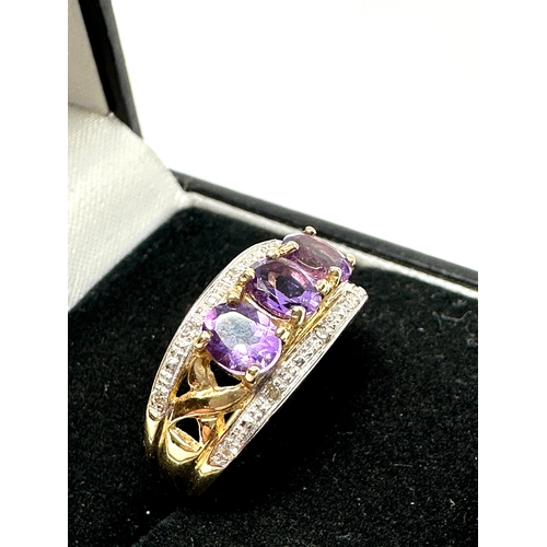 98 - 9ct gold Amethyst & diamond ring weight 3.7g