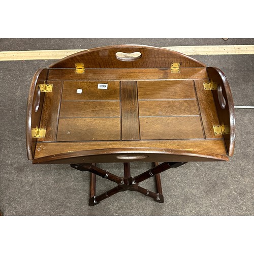 603 - Hardwood butlers tray with brass hinged sides on a separate crossed framed base, approximately measu... 