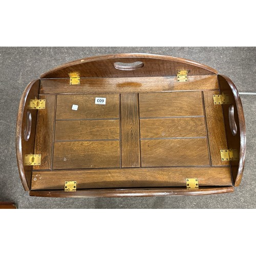 603 - Hardwood butlers tray with brass hinged sides on a separate crossed framed base, approximately measu... 