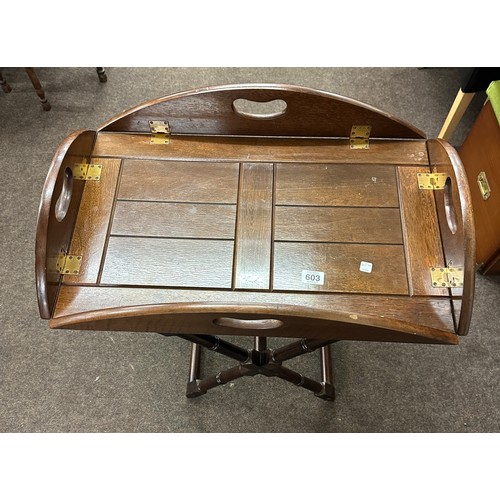 603 - Hardwood butlers tray with brass hinged sides on a separate crossed framed base, approximately measu... 