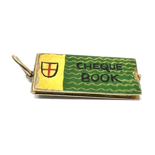 109 - Vintage 9ct gold opening cheque book charm weight 2.7g