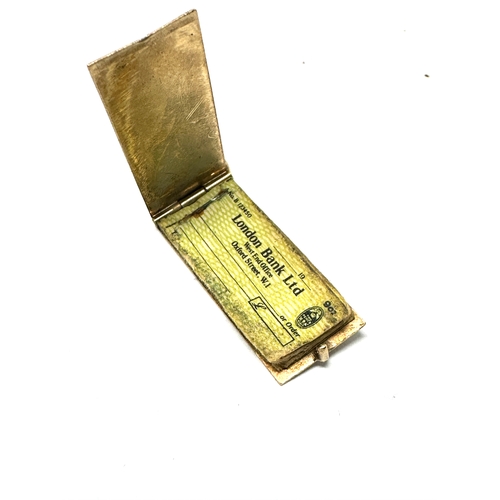 109 - Vintage 9ct gold opening cheque book charm weight 2.7g