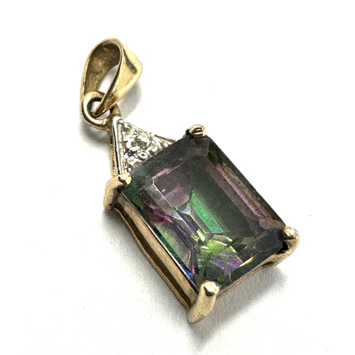 113 - 9ct gold mystic topaz & diamond pendant weight 1.4g