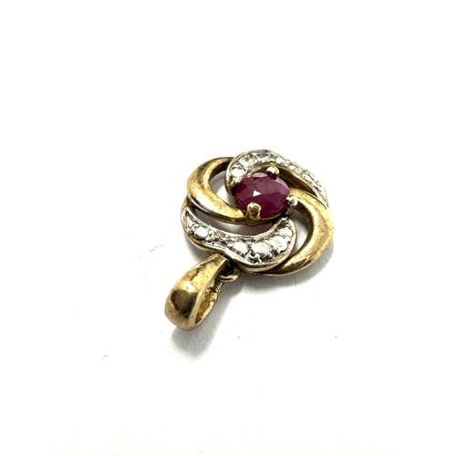 115 - Small 9ct gold ruby pendant weight 0.8g