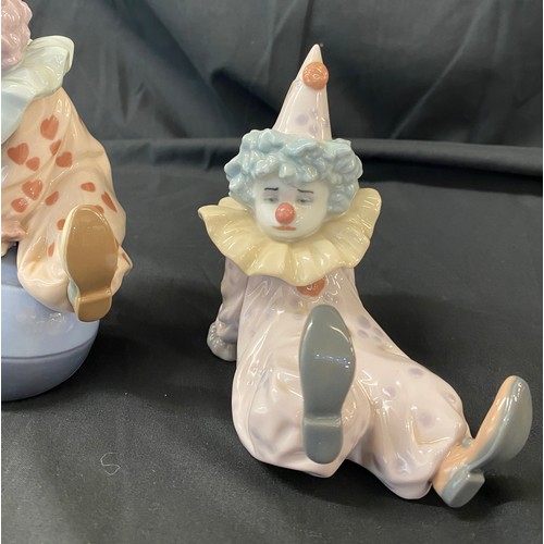 56 - Two Lladro clown figures includes  