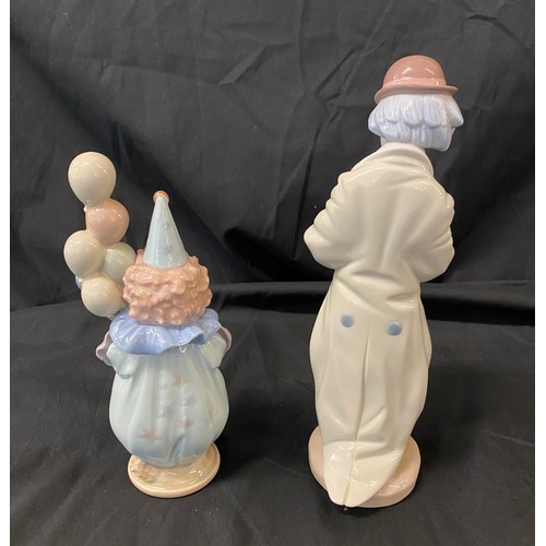 38 - Two Lladro clown figures includes Lladro clown with balloons and Lladro clown with trumpet