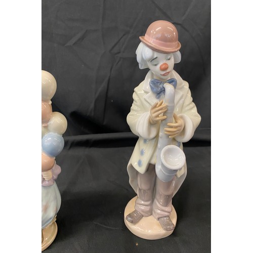 38 - Two Lladro clown figures includes Lladro clown with balloons and Lladro clown with trumpet