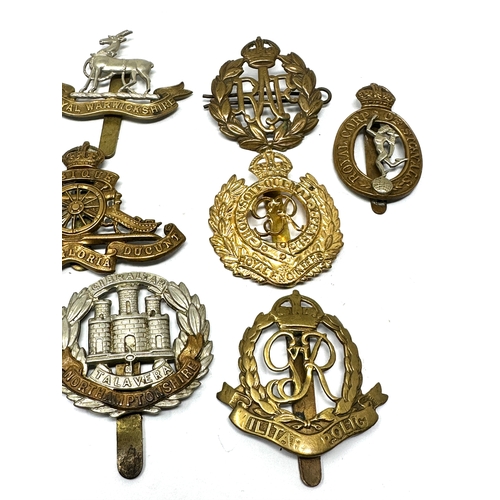 74 - 10 military cap badges