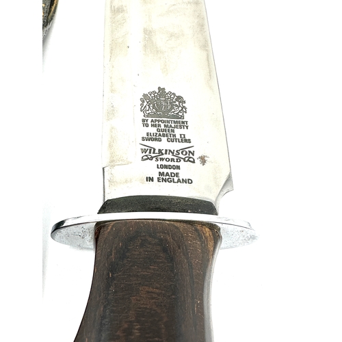 73 - Wilkinson sword Bowie knife in leather scabbard