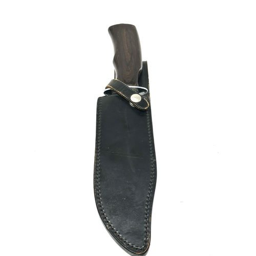 73 - Wilkinson sword Bowie knife in leather scabbard