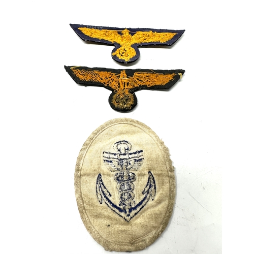 50 - 3 ww2 german Kriegsmarine insignia inc officers breast eagle