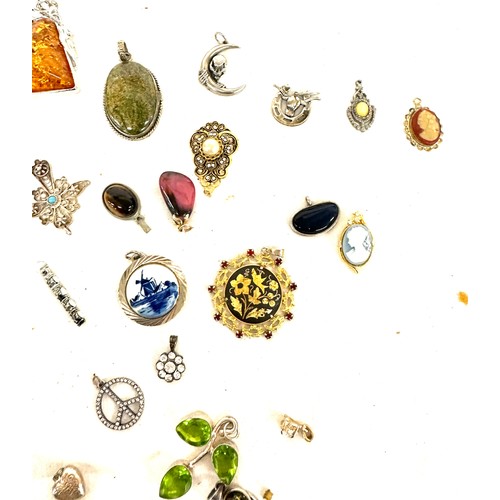 463 - Large selection of vintage and later pendants