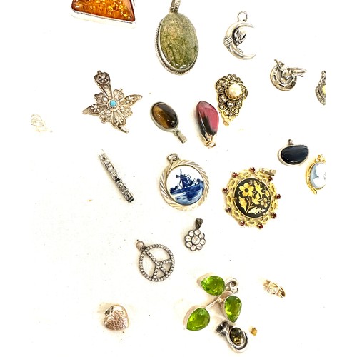 463 - Large selection of vintage and later pendants