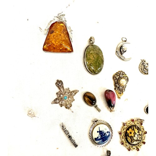 463 - Large selection of vintage and later pendants