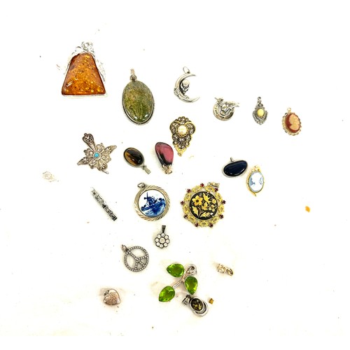 463 - Large selection of vintage and later pendants