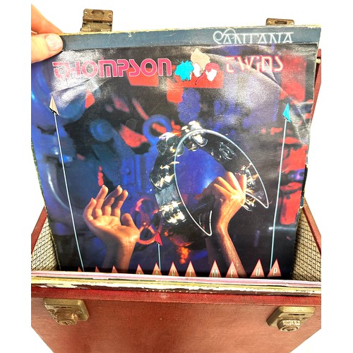 320 - Large selection of UK lps in a carrier case includes Thin Lizzy, Grease, Howard Jones etc