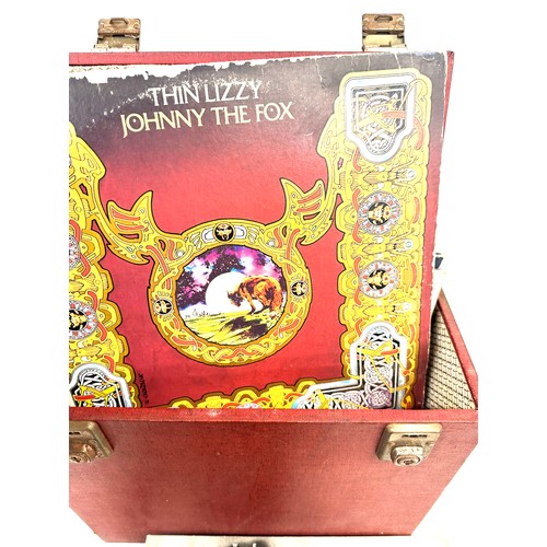 320 - Large selection of UK lps in a carrier case includes Thin Lizzy, Grease, Howard Jones etc