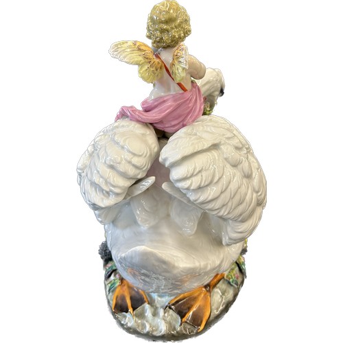 7 - Antique porcelain swan and cherub ornament, with flowers, leaves and fruit, this piece is damaged as... 