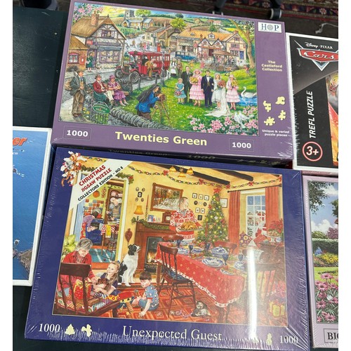 292 - Selection of brand new puzzles includes Lightening Mcqueen, Twenties Green etc